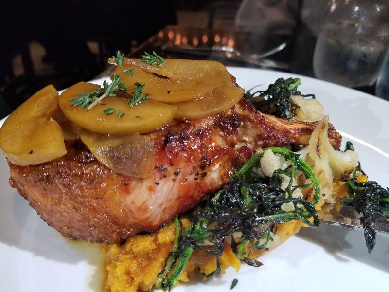 In spite of all the forces working against them, the owners of One Coastal in Fenwick still manage to put out a remarkable double-cut pork chop with all the trimmings. BOB YESBEK PHOTO